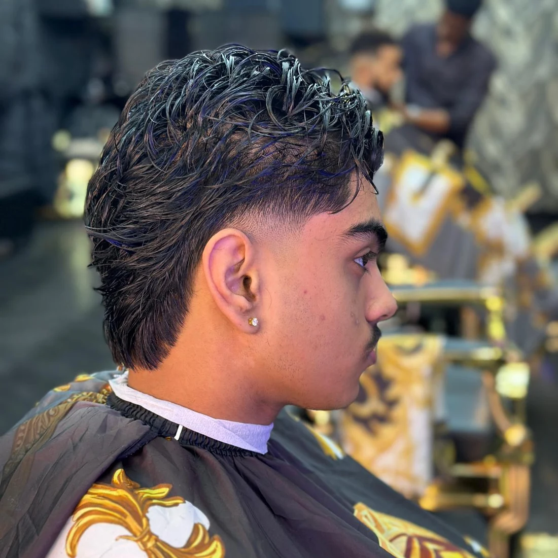 Precisely finished haircut with a fade at L’Artiste